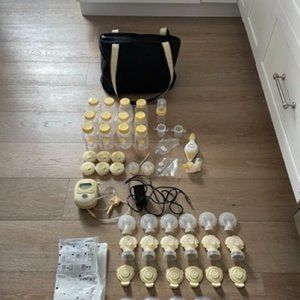 Medela Freestyle Pump, Charger, Bottles and Spare Parts